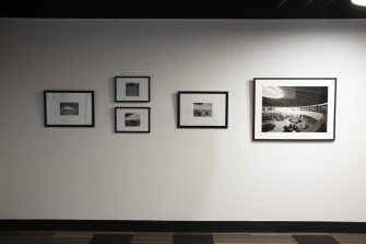 A gallery with five framed black-and-white photographs featuring UNSW architecture.