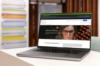 Laptop screen showing Elsevier website