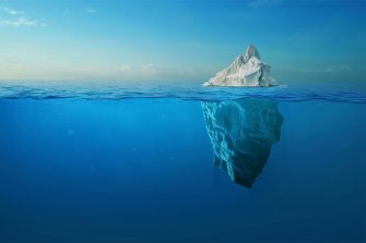 Subject guides - Grey literature An iceberg with a large hidden mountain beneath the ocean surface.