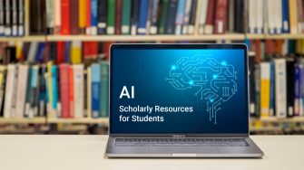 A laptop open with its screen facing forward. A blue image is on its screen. The image shows glowing linked lines in the shape of a brain, with the text: 'AI Scholarly Resources for Students'. 