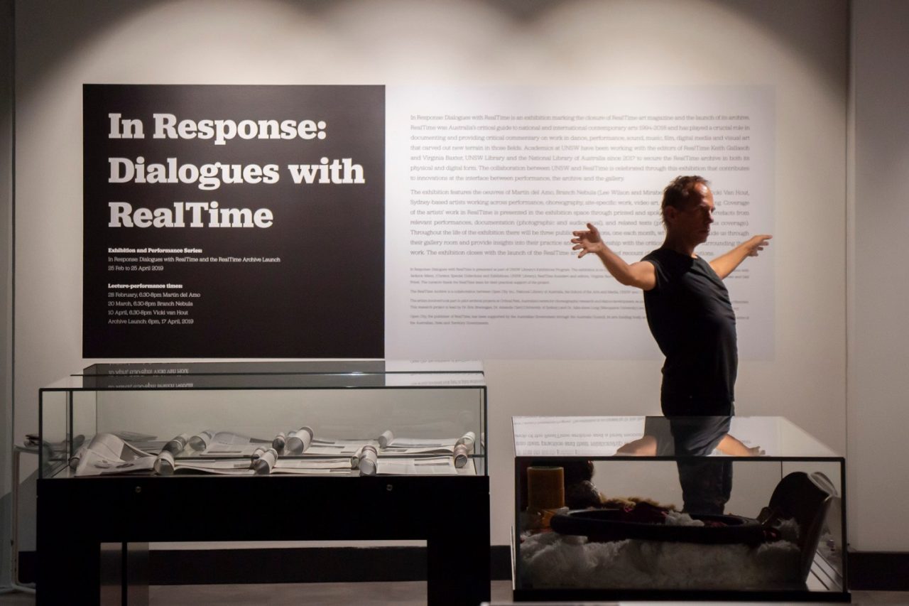 Martin del Amo performing in front of installation