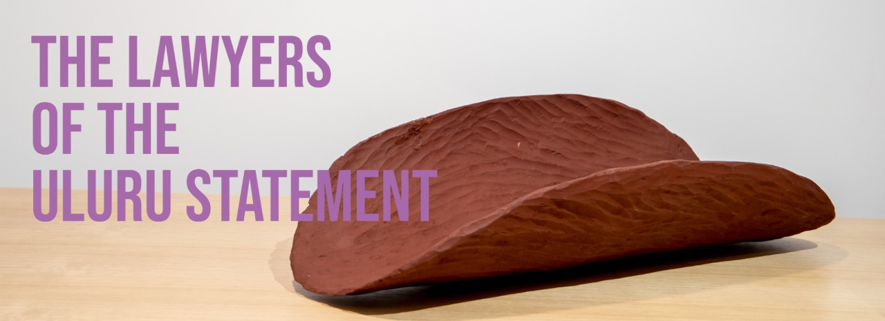 Piti. Oval shaped object with curved sides made from red clay. Exhibition title text overlay.